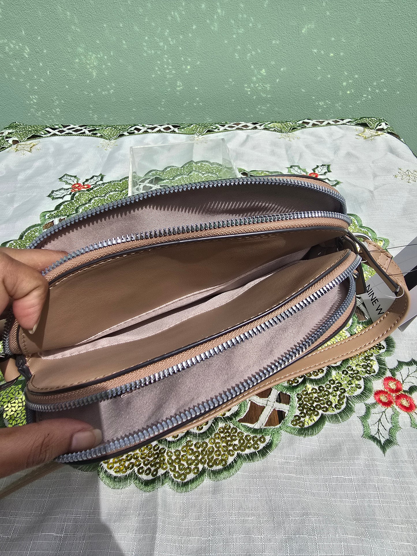 Nine West Triple Crossbody Dome Shape with double zipper cream logo